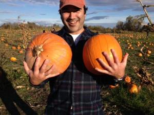 Anthony Alvarado picks pumpkins